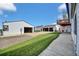 Exterior view of home and outbuildings on bright sunny day at 13080 County Road 19, Platteville, CO 80651