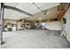 Spacious garage with ample storage and a high ceiling, ready for your projects and hobbies at 13080 County Road 19, Platteville, CO 80651