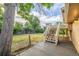 Spacious backyard with a deck, patio and a brick house at 12883 E Nevada Cir, Aurora, CO 80012