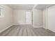 A spacious bedroom with gray carpet and neutral walls at 12883 E Nevada Cir, Aurora, CO 80012