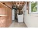 A utility room with water heater and washer/dryer hookups at 12883 E Nevada Cir, Aurora, CO 80012