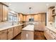 Well-lit kitchen featuring an island, stainless steel appliances, and plenty of counter space for cooking at 270 Terra Vista St, Brighton, CO 80601