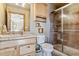 Bathroom with shower, toilet, vanity, and built-in shelves at 10010 Steeplechase Dr, Franktown, CO 80116