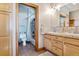 Double vanity bathroom with a shower/tub combo at 10010 Steeplechase Dr, Franktown, CO 80116