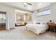 Spacious main bedroom with sitting area and deck access at 10010 Steeplechase Dr, Franktown, CO 80116