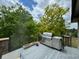 Outdoor deck with built-in grill and scenic views at 10010 Steeplechase Dr, Franktown, CO 80116