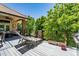 Deck with lounge chairs and a view of the trees at 10010 Steeplechase Dr, Franktown, CO 80116