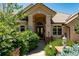 Inviting home exterior featuring a grand entrance and landscaping at 10010 Steeplechase Dr, Franktown, CO 80116