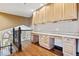 Loft area with built-in wooden desk and cabinets at 10010 Steeplechase Dr, Franktown, CO 80116