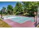 Multi-purpose outdoor sports court with basketball and tennis at 10010 Steeplechase Dr, Franktown, CO 80116