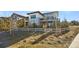 Exterior shot of a backyard with a split rail fence at 775 Woodgate Dr, Littleton, CO 80126