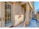The exterior features a covered entryway with an attractive door with sidelights, stone walls, and columns at 1950 N Logan St # 102, Denver, CO 80203