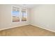 Bright bedroom with large windows and views of the landscape at 9581 Firenze Way, Highlands Ranch, CO 80126