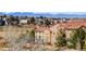 Beautiful exterior view of a home in a neighborhood with a mountain view at 9581 Firenze Way, Highlands Ranch, CO 80126