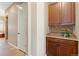Hallway with custom carpentry and lighting at 9581 Firenze Way, Highlands Ranch, CO 80126