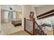 Hallway view towards the bedroom and kitchen, highlighting the home's open layout at 4967 E Lake Ave, Centennial, CO 80121