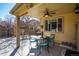 Covered patio with a ceiling fan and outdoor furniture set at 4967 E Lake Ave, Centennial, CO 80121