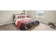 Bedroom with natural light, neutral walls, and stylish decor at 14075 Scarlet Sage St, Parker, CO 80134