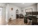 Home office features dark wood floors and neutral walls at 14075 Scarlet Sage St, Parker, CO 80134