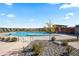 Beautiful community pool with comfortable sundeck, neighborhood views and adjacent to a covered pavilion at 14075 Scarlet Sage St, Parker, CO 80134
