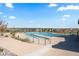 Community pool featuring a zero-entry access point and comfortable sundeck at 14075 Scarlet Sage St, Parker, CO 80134