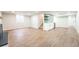 Finished basement featuring a kitchenette, fireplace, and an open layout at 11383 W 28Th Ave, Lakewood, CO 80215