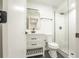 Modern bathroom features a vanity, black fixtures, and a glass enclosed shower at 11383 W 28Th Ave, Lakewood, CO 80215