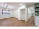 Dining area showcasing built-in cabinets, wood floors, and modern lighting fixtures at 11383 W 28Th Ave, Lakewood, CO 80215