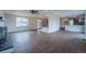 Bright living room with recessed lighting, an open staircase, and hardwood floors at 11383 W 28Th Ave, Lakewood, CO 80215