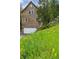 Charming wood home with a two-car garage and natural landscaping at 4978 Camel Heights Rd, Evergreen, CO 80439