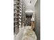 Walk-in wine cellar with herringbone flooring and abundant bottle storage at 4978 Camel Heights Rd, Evergreen, CO 80439