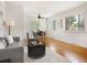 Bright dining room with a modern ceiling fan, natural light and hardwood floors at 6223 Gray St, Arvada, CO 80003