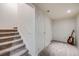 Stairway leading down to the basement at 13275 Holly St # E, Thornton, CO 80241
