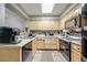 Functional kitchen with sleek countertops, updated appliances, and a design perfect for cooking at 13275 Holly St # E, Thornton, CO 80241
