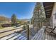 Beautiful balcony view overlooking trees and mountains, perfect for relaxing outdoors at 424 Peery Pkwy, Golden, CO 80403