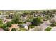 Aerial view of a residential neighborhood with tree-lined streets at 3322 Simms St, Wheat Ridge, CO 80033
