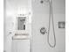 Bright bathroom featuring shower and granite countertop vanity at 3322 Simms St, Wheat Ridge, CO 80033
