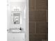 Bathroom with granite countertops, stylish tile and updated lighting at 3322 Simms St, Wheat Ridge, CO 80033