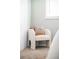 Comfortable bedroom chair with stylish pillow, offering a cozy nook to relax at 3322 Simms St, Wheat Ridge, CO 80033