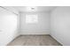 Bright empty bedroom with carpeted floors and a closet at 3322 Simms St, Wheat Ridge, CO 80033