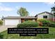 Charming single-story home with well-maintained lawn and attached two-car garage at 3322 Simms St, Wheat Ridge, CO 80033