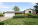 Charming single-Gathering home with a well-maintained lawn and attached two car garage at 3322 Simms St, Wheat Ridge, CO 80033