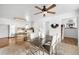 Open floor plan featuring dining room and a peek into the kitchen at 3322 Simms St, Wheat Ridge, CO 80033