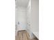 Clean entryway with hardwood floors leads past coat storage at 3909 Piney Grove St, Evergreen, CO 80439