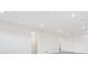 Large room featuring recessed lighting, white walls, and access to additional rooms at 3909 Piney Grove St, Evergreen, CO 80439