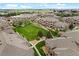 Aerial view of a beautiful condo community with lush green spaces, manicured lawns, and mature trees at 7440 S Blackhawk St # 2-108, Englewood, CO 80112