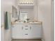 Bathroom featuring double vanity, large mirror, and lots of storage at 7440 S Blackhawk St # 2-108, Englewood, CO 80112