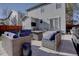 Inviting backyard patio with comfortable outdoor furniture, perfect for entertaining at 3734 Dexter St, Denver, CO 80207