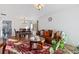 Bright dining area with hardwood floors and a chandelier at 19813 E 47Th Ave, Denver, CO 80249