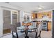 Kitchen with stainless steel appliances and breakfast nook at 19813 E 47Th Ave, Denver, CO 80249